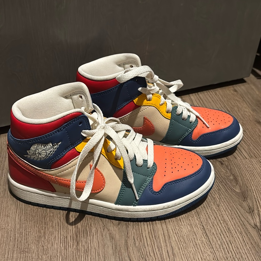 Multi color air Jordan high top Nikes